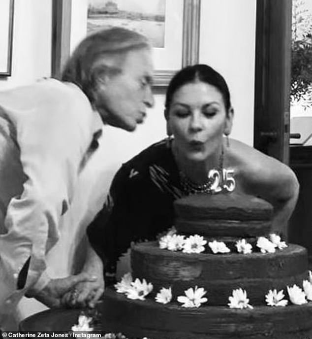Sweet: The happy couple blew out their candles before taking to Instagram to commemorate the day