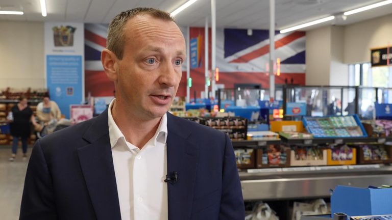 Aldi has pledged to continue offering the lowest grocery prices in the UK despite a sharp drop in profits.