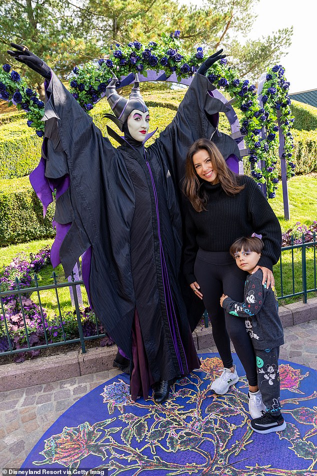 Disney Day Trip: Standing next to Eva and her little Santiago the Disney character Maleficent, played by Angelina Jolie in the 2014 film