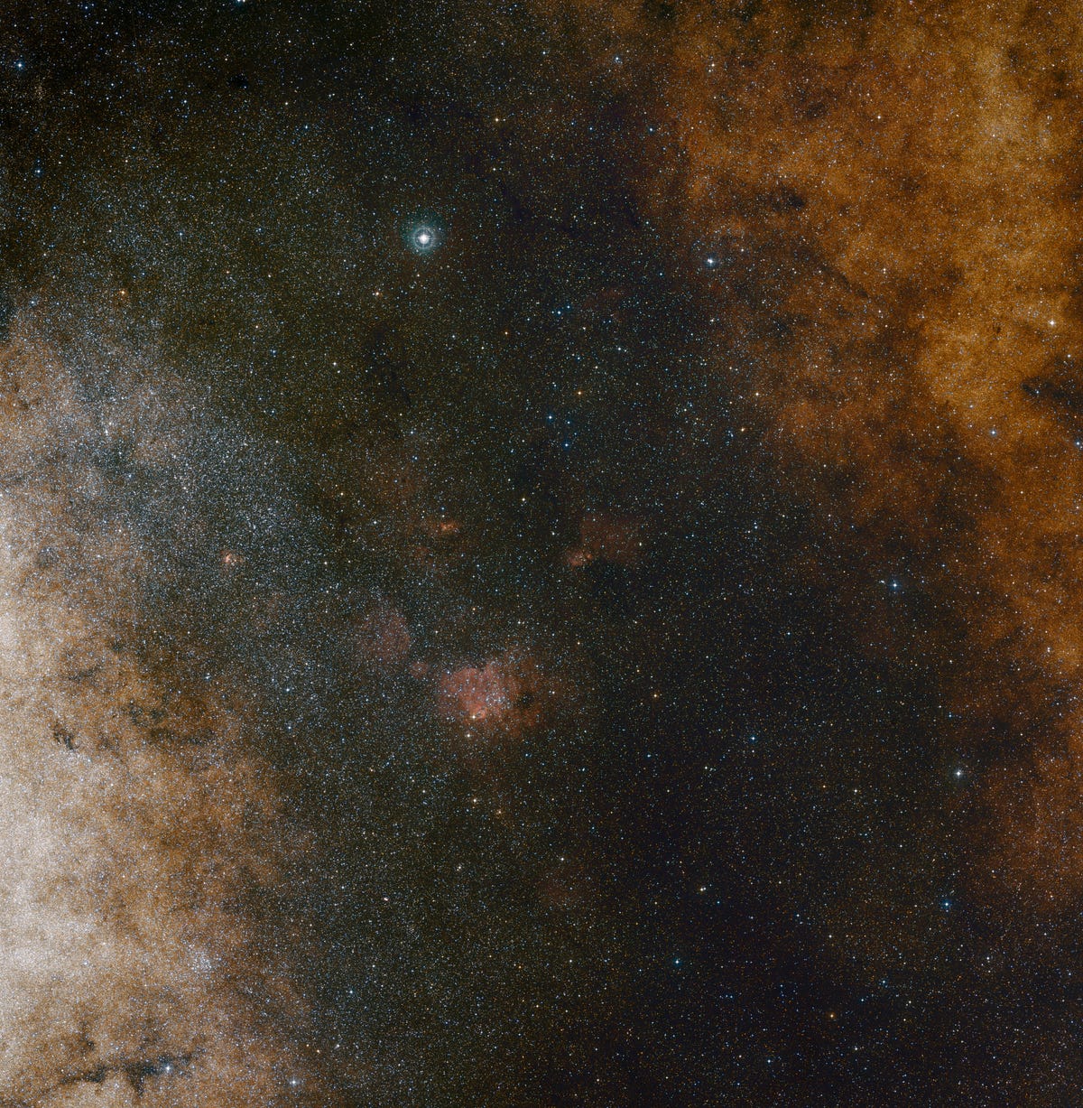 A darker color scheme with navy blue, dark gray and burnt orange shows a starry view of our Milky Way's core from a side angle.
