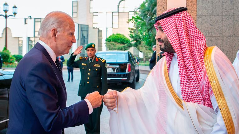 Saudi Crown Prince Mohammed bin Salman greets President Joe Biden with a thumbs up after arriving in Jeddah, Saudi Arabia.