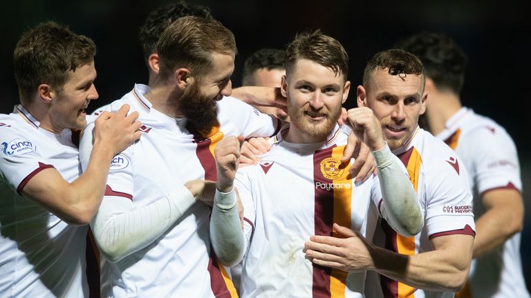 DINGWALL, SCOTLAND - OCTOBER 04: Callum Slattery of Motherwell celebrates after making it 2-0 during a cinch Premiership match between Ross County and Motherwell at the Global Energy Stadium on October 04, 2022 in Dingwall, Scotland.  (Photo by Mark Scates/SNS Group)